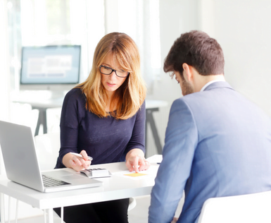 Business colleagues collaborating on a project in a modern office