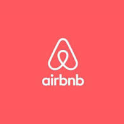 Airbnb logo on a red background
